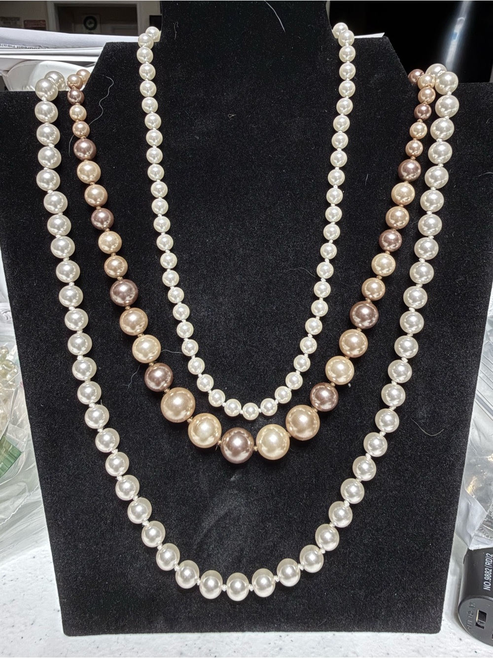 Classic Pearl Necklaces in White and Champagne. one sterling hardware.